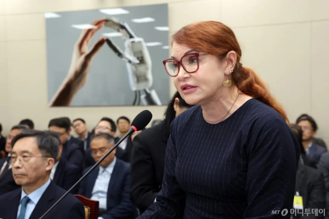 Kathleen Lin, an X executive for the Asia-Pacific region, answering lawmakers' questions at a National Assembly audit hearing in Seoul.
